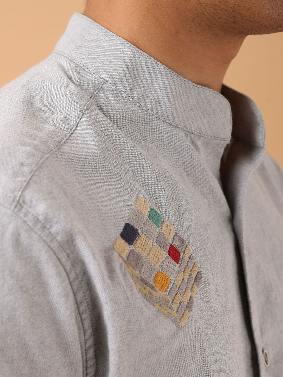 Embroidered cube